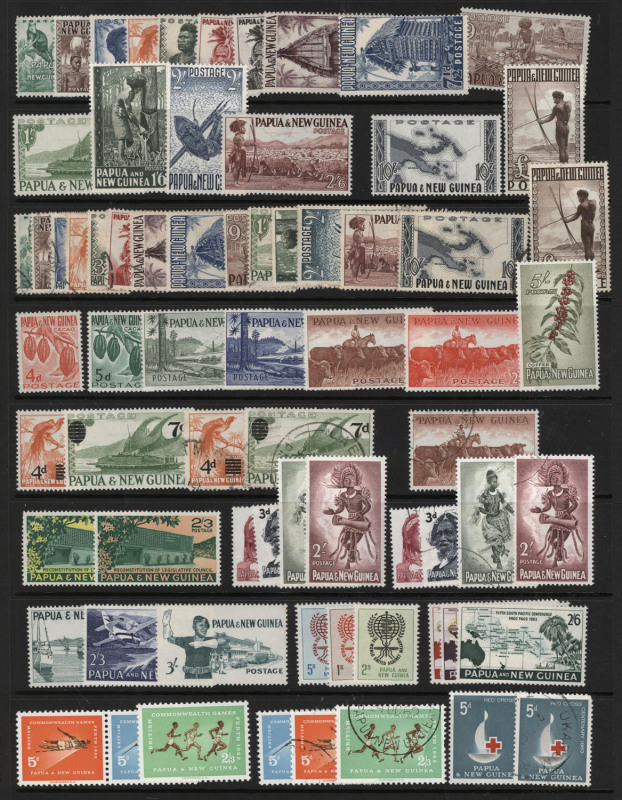 PAPUA NEW GUINEA: 1952-1990s accumulation crammed into binder with 1952 Pictorial set to £1 MUH & used, 10/- Rabaul & £1 QEII MUH & used, 1964 Birds & 1968 Shells in MUH blocks of 4, many other MUH sets some in blocks of 4, plus surcharges, M/Ss and FDCs;