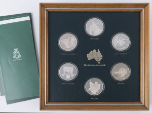Coins - Australia: Silver: 1976 'The Australian State Medals' marking the 75th Anniversary of Federation comprising six 1oz sterling silver medals honouring each Australian State, mounted in a frame, with original presentation box (few scuff marks).