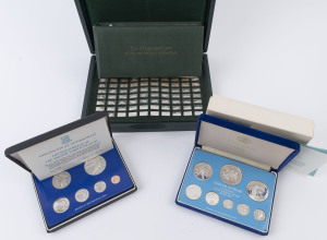 Coins - World: Small group comprising Franklin Mint 1975 Belize & British Virgin Islands silver proof coin sets, also 1976 Pinches Mint 'The 100 Greatest Cars Silver Miniature Collection' (Retail $250+) in presentation case with accompanying booklet, CofA