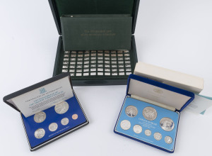 Coins - World: Small group comprising Franklin Mint 1975 Belize & British Virgin Islands silver proof coin sets, also 1976 Pinches Mint 'The 100 Greatest Cars Silver Miniature Collection' (Retail $250+) in presentation case with accompanying booklet, CofA and magnifying glass.