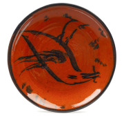 ARTUR HALPERN: Two pottery platters with bird motifs, signed "A. Halpern" and "A.H.", 25cm and 30cm diameter