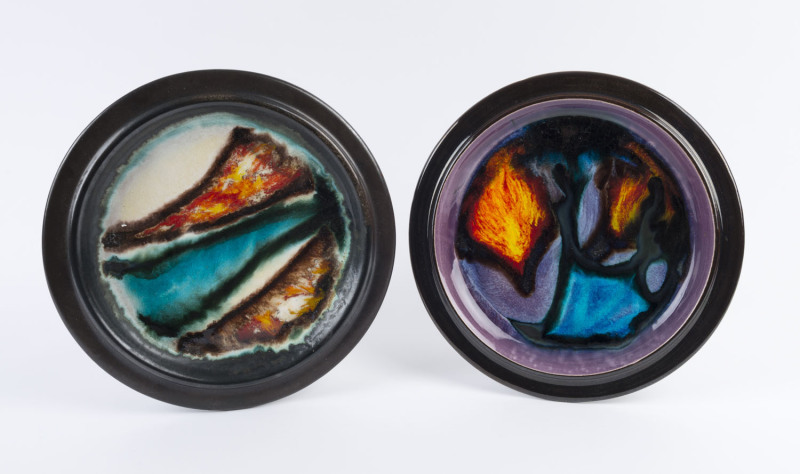 ELLIS pair of pottery platters with abstract designs, both incised "Ellis, 89", 32.5cm diameter