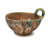 NEIL DOUGLAS and ARTHUR MERRIC BOYD pottery teacup decorated with possum, rabbit and lyrebird as well as a bush camp scene, not signed, 8cm high, 15cm wide