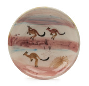 ARTHUR MERRIC BOYD pottery dish hand-painted with three kangaroos in pink desert landscape signed underglaze "Boyd", 10.5cm diameter