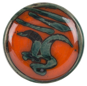 ARTUR HALPERN pottery serving plate with orange glaze and abstract design, signed monogram "A.H.", 25cm diameter