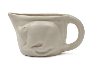 MELROSE WARE pottery "Possum" jug in rare cream glaze, stamped "Melrose Ware, Australia", 11cm high, 21cm wide