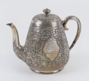 A four piece silver plated tea service with Persian style all over floral patterned repouss&eacute; decoration, circa 1885, ​the largest 23cm high - 2