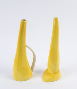 An Italian retro yellow porcelain jug and matching vase, circa 1950's, (2 items), stamped "Hand-Painted Italy", with Buckley & Nunn retailer's label, ​31cm high