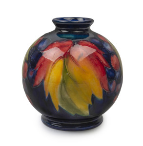 MOORCROFT "Leaf and berry" spherical pottery vase, circa 1930's, incised signature and stamped "Made In England", paper label "By Appointment W. Moorcroft, Potter To H.M. The Queen", 10.5cm high