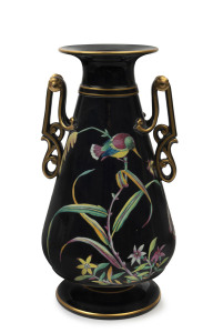 An English porcelain mantel vase with enamel bird and butterfly decoration on black ground, circa 1860's, stamped "Malvern", ​30cm high