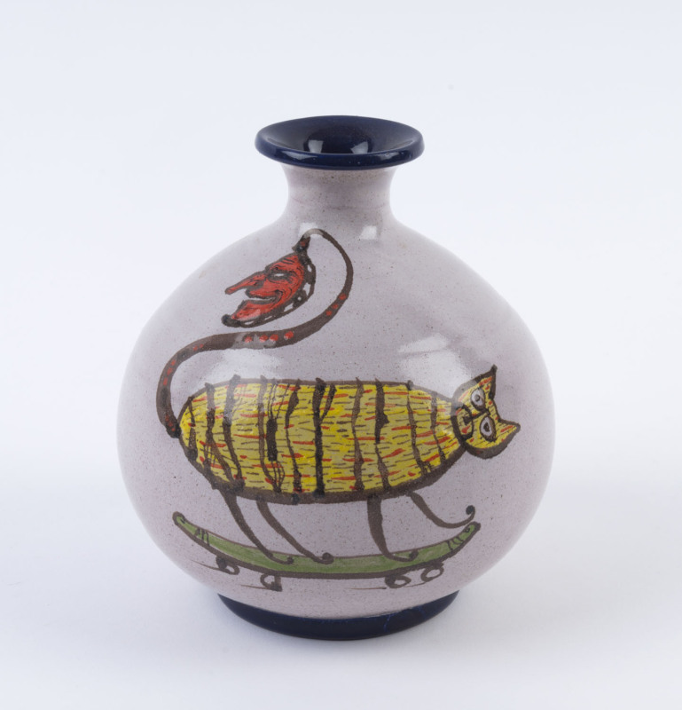 ARTIST UNKNOWN pottery vase decorated with a cat on a skateboard, signed and dated (illegible), 14cm high