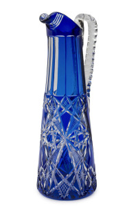 A Bohemian blue overlay cut crystal ewer, early 20th century, 31cm high
