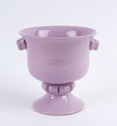 MARTIN BOYD pink glazed pottery urn with cherub handles, incised "Martin Boyd", 15cm high, 17cm wide