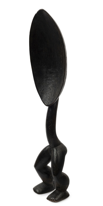 A Dan, anthropomorphic ceremonial ‘po’ spoon, with carved legs, Ivory Coast, Africa, 19th century, 66cm high