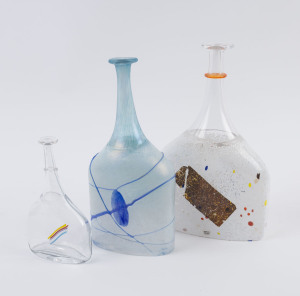 KOSTA BODA Three Swedish art glass bottle vases by BERTIL VALLIEN, (3 items), engraved "Kosta Boda, Artist Coll. B.Vallien" and "Atelier", ​29cm, 27cm and 17.5cm high