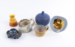 Six pieces of Australian pottery comprising an ARTHUR MERRIC BOYD vase, PHILIPPA JAMES mug, ERIC JUCKERT blue glazed vase, JANET GRAY hand dish, Keith Nichol landscape jug and a Decor Australia dish, ​the Juckert vase 11.5cm high