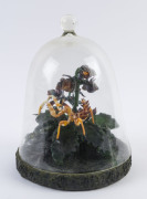 CHRISTIAN ARNOLD and LAURIE YOUNG hot glass scorpion and orchid sculpture on pate de verre glass base under glass bell dome, ​circa 2007, 31cm high