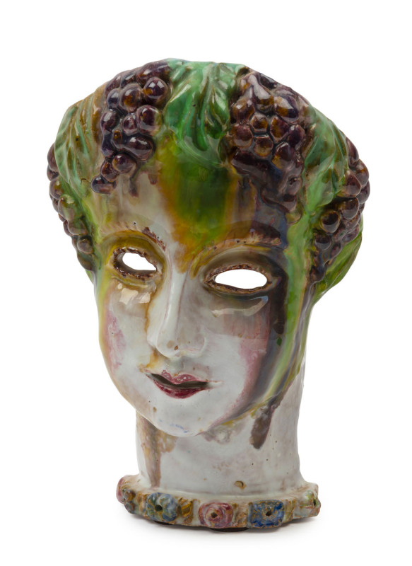 ARTIST UNKNOWN pottery face mask vase adorned with grapes and leaves, most likely Italian, mid 20th century, ​20cm high