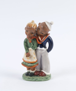 A ceramic figure group, most likely Austrian, circa 1920's, 15cm high