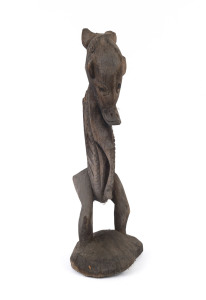 A tribal statue, carved wood, Papua New Guinea, ​51cm high