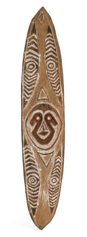 A Gopi board, carved wood with natural earth pigments, Papua New Guinea, ​71cm high