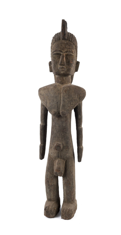 A tribal statue, carved wood, West African, ​91cm high