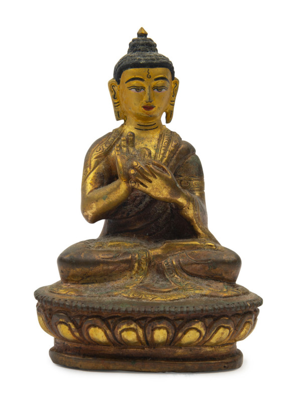 A Tibetan gilt bronze seated Buddha statue, 18th/19th century, ​8.5cm high