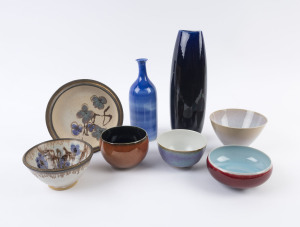 Eight assorted pieces of Australian studio pottery including two vases, a plate and five bowls, the largest 31cm high
