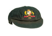 ALAN CONNOLLY'S AUSTRALIAN "BAGGY GREEN" TEST CAP, from the 1968 Ashes series, green wool with embroidered Australian Coat-of-Arms & "1968" on front, farmer's label inside with initials "AC". Very good match-used condition. [Alan Connolly played 29 Tests