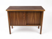 An Australian retro sideboard, black bean and ash with sliding doors, circa 1960s, 74cm high, 90cm wide, 40cm deep