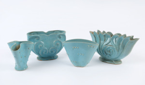 JANET GRAY group of four Australian pottery vases with turquoise glazes, incised "Janet Gray", the largest 13cm high, 22cm wide
