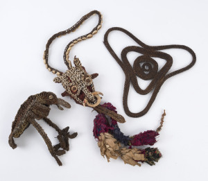 Three tribal artefacts, woven fibre, natural earth pigments, shell and cloth, Papua New Guinea, early to mid 20th century, ​the necklace 66cm long