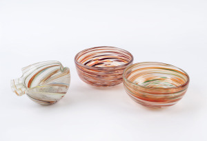 Three assorted Murano glass bowls, one in the form of a fish, circa 1960 the largest 13cm diameter
