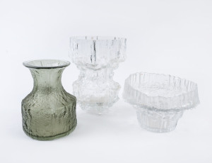 TAPIO WIRKKALA and TIMO SARPANEVA: Three Finnish glass vases for Iittala, grey piece engraved "Timo Sarpaneva, 3357", squat vase engraved "Tapio Wirkkala, 3450", tall example with "Iittala" label, the largest 21.5cm high