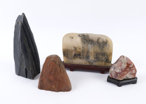 Four Chinese scholar's stones, two with wooden bases, the largest 23cm high
