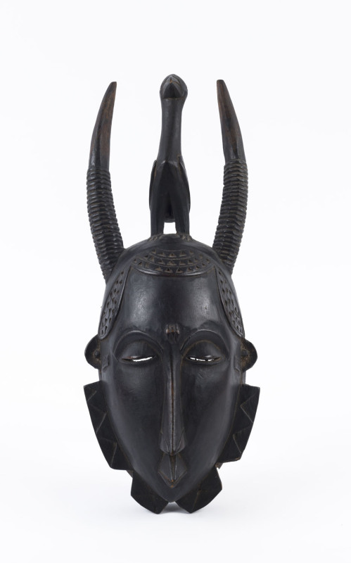 Djimini tribal mask with antelope horns and bird totem, carved wood, Ivory Coast, Africa, 40cm high