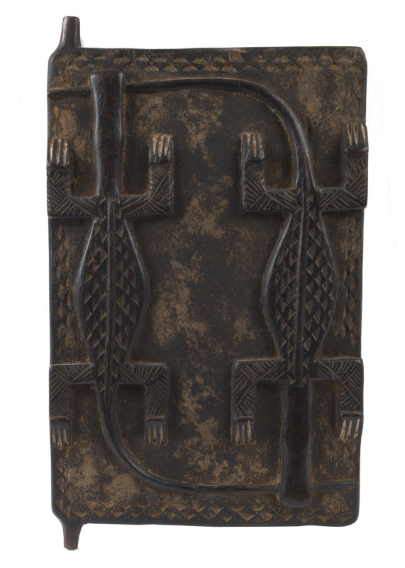 A Boule door panel with carved crocodile design, Ivory Coast, Africa, 50 x 29cm