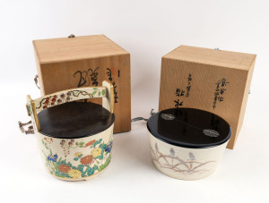 Two Japanese pottery rice carriers with black lacquered lids, both in original spruce boxes, the larger 25cm high
