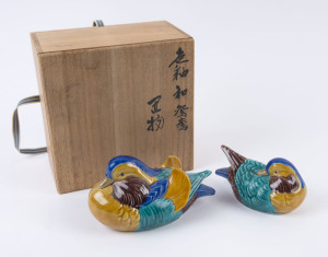 A pair of Kutani ware Mandarin ducks in wooden case, the larger 17cm long