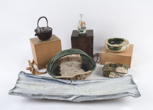 Japanese bronze sake kettle, porcelain water pot, large pottery platter, pottery bowl, box and large bowl with handle, (6 items), serving tray 68cm wide