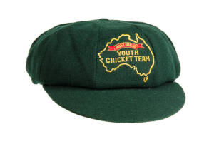CRAIG McDERMOTT'S AUSTRALIAN "BAGGY GREEN" YOUTH TEAM CAP, green wool with on front embroidered map of Australia with "Australia/Youth Cricket Team" inside map. Good match-worn condition. Ex Craig McDermott collection.