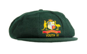 CRAIG McDERMOTT'S AUSTRALIAN "BAGGY GREEN" YOUTH TEAM CAP, green wool with embroidered Australian Coat-of-Arms & "YOUTH XI" on front, named inside to Craig McDermott. Good match-worn condition. Ex Craig McDermott collection.