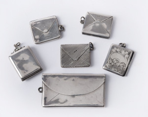 Collectables: Stamp Boxes - Silver: mostly Edwardian selection, all in envelope form designs, with fob chain rings, comprising 1903 Sydney & Co single-size case (27x24mm) engraved "LG" on front, weight 4gr, hallmarked in Chester; 1905 Albert E Jones single-size (27x23mm) engraved "DKB" on front, weight 5gr, hallmarked in Chester; 1906 Gourdel Vales & Co single-size case with diagonal ribbing (28x23mm), weight 5gr, hallmarked in Birmingham;