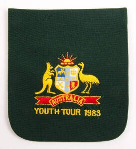 CRAIG McDERMOTT'S AUSTRALIAN YOUTH TRACKSUIT TOP & BLAZER POCKET: "Puma" tracksuit top in green & gold, embroidered on breast "Australian/ Under 19 /Youth Test Team/1981.82.83". Blazer pocket embroidered with Australian "Coat-of-Arms & "Youth Tour 1983". 