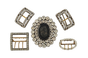 An antique French jet and cut glass cameo brooch; plus four antique shoe buckles, early 19th century, the brooch 8cm high