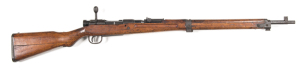 JAPANESE ARISAKA TYPE 99 SHORT RIFLE: 7.7x58; 5 shot mag; 25.2" barrel; g. bore; std sights, swivel, bayonet stud, chrysanthemum & characters to the breech; side rail with TOKYO Arsenal mark; g. profiles & clear markings; plum patina to all metal; g. stoc