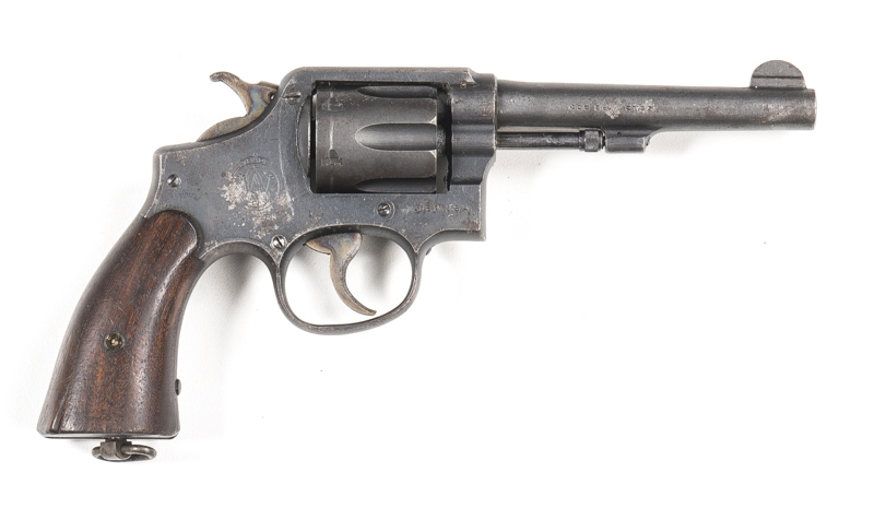 SMITH & WESSON VICTORY MODEL SERVICE REVOLVER: 38 S&W; 6 shot fluted cylinder; 127mm (5") barrel; g. bore; std sights & markings; g profiles & markings; patchy grey parkerised finish to barrel, cylinder & frame; case colours to hammer & trigger; g. S&W pl