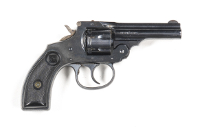 H & R PREMIER R/F REVOLVER: 22 LR; 7 shot fluted cylinder; 89m (3½") barrel g. bore; std sights, barrel address, Model marking & 22 RIM-FIRE; sharp profiles & clear markings; retaining 98% original blue finish; exc black chequered grips; gwo & exc cond. #