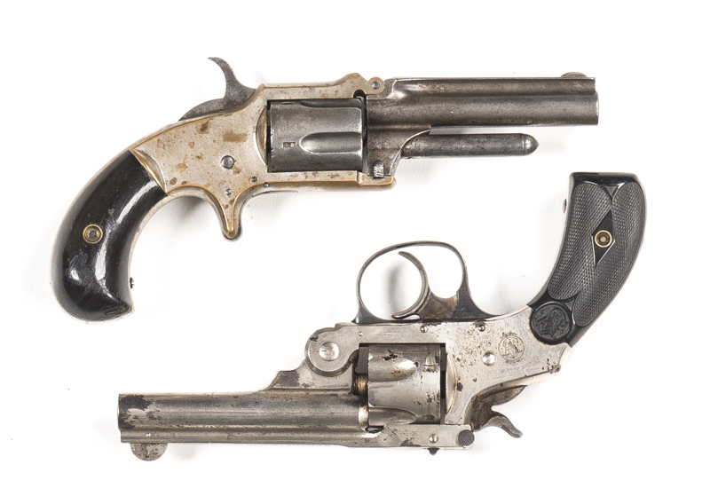 2 REVOLVERS: S&W D/A 5TH MODEL C/F: 32 S&W; 5 shot fluted cyl; 83mm (3¼") barrel; p. bore; std sights & barrel address; S&W trade mark to rhs of frame; g. profiles & clear markings; 75% orig nickel finish remains; vg S&W blk chequered grips; gwo & cond. M