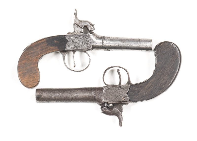 2 ENGLISH S/B PERC POCKET PISTOLS: 50 Cal; 3¾" barrel; f. bore; no sights; foliate engraved boxlock centre hammer action; g. profiles; clear engraving; grey finish to all metal; g.slab sided walnut grips; gwo & fair cond. C.1860. 43 Cal: 2½" rnd barrel; n